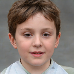 Joyful white child male with short  brown hair and brown eyes