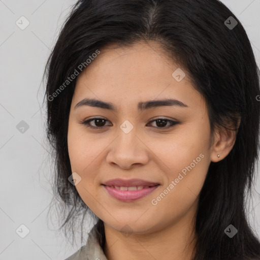 Joyful asian young-adult female with long  brown hair and brown eyes