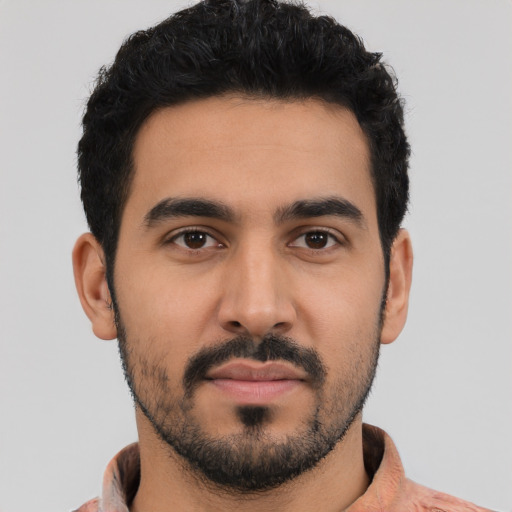 Neutral latino young-adult male with short  black hair and brown eyes