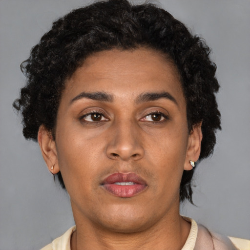 Neutral latino young-adult female with short  brown hair and brown eyes
