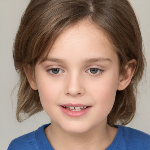 Joyful white child female with medium  brown hair and brown eyes