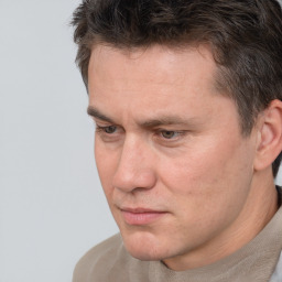 Neutral white adult male with short  brown hair and brown eyes