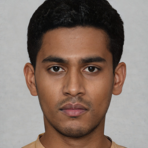 Neutral latino young-adult male with short  black hair and brown eyes