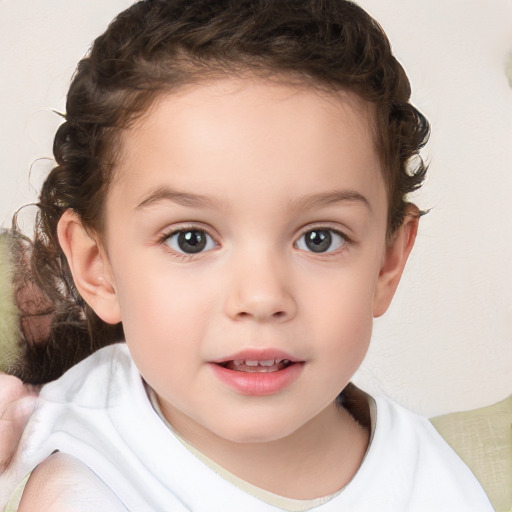 Joyful white child female with short  brown hair and brown eyes