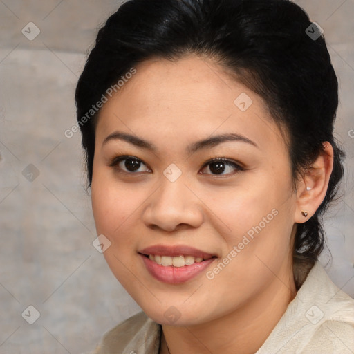 Joyful asian young-adult female with medium  brown hair and brown eyes