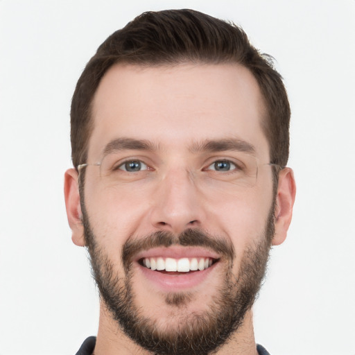 Joyful white young-adult male with short  brown hair and brown eyes