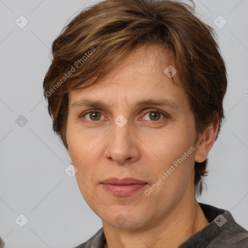 Joyful white adult female with short  brown hair and brown eyes