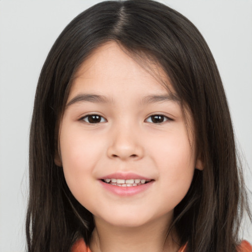 Joyful white child female with long  brown hair and brown eyes