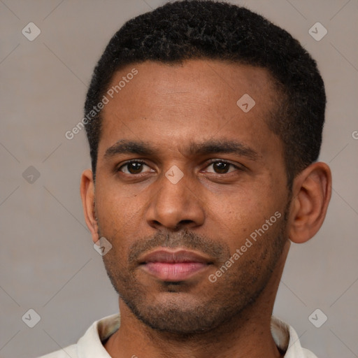 Neutral latino young-adult male with short  black hair and brown eyes