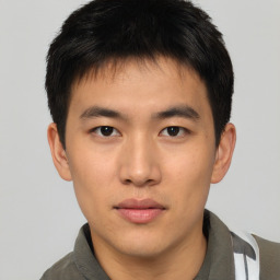 Neutral asian young-adult male with short  brown hair and brown eyes