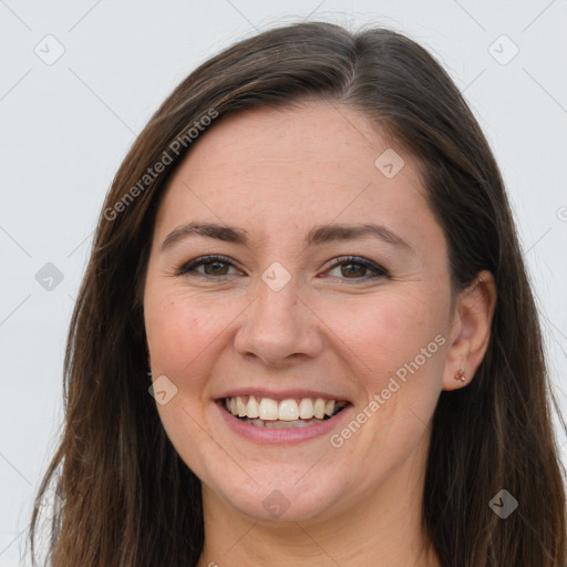 Joyful white young-adult female with long  brown hair and grey eyes