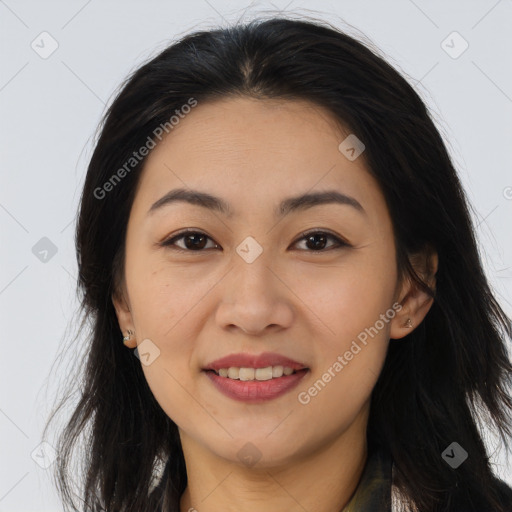 Joyful asian young-adult female with long  brown hair and brown eyes