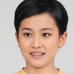 Joyful asian young-adult female with short  black hair and brown eyes