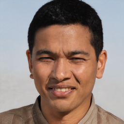 Joyful white adult male with short  black hair and brown eyes