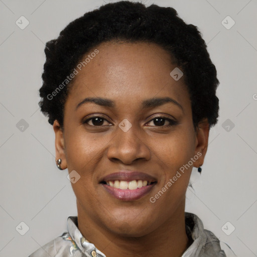 Joyful latino young-adult female with short  black hair and brown eyes