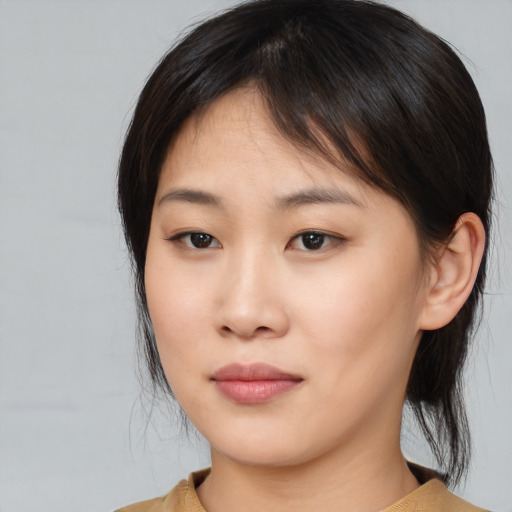 Neutral asian young-adult female with medium  brown hair and brown eyes