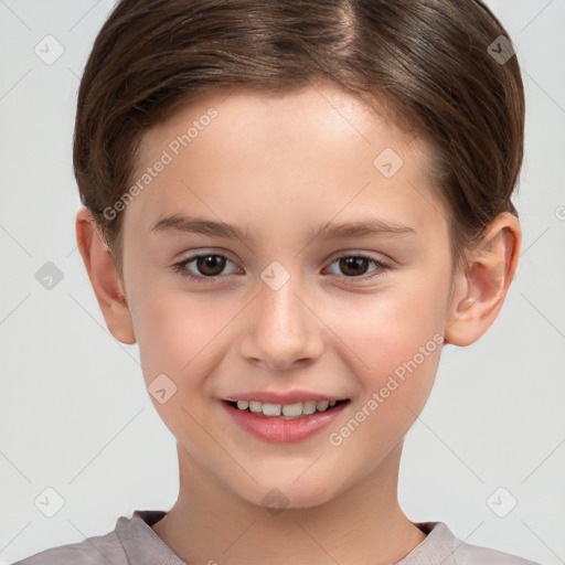 Joyful white child female with short  brown hair and brown eyes