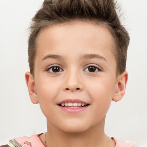 Joyful white child female with short  brown hair and brown eyes