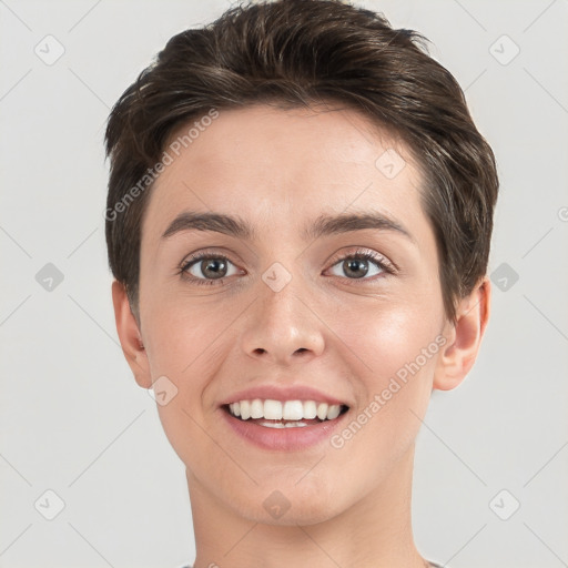 Joyful white young-adult female with short  brown hair and brown eyes