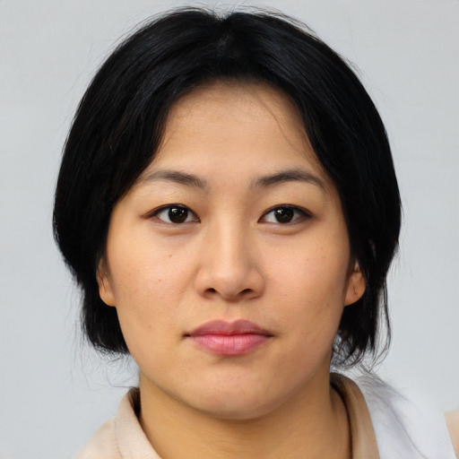 Neutral asian young-adult female with medium  black hair and brown eyes