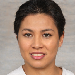 Joyful asian young-adult female with short  brown hair and brown eyes