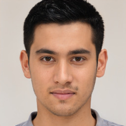 Neutral asian young-adult male with short  brown hair and brown eyes