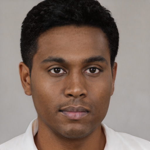 Neutral black young-adult male with short  black hair and brown eyes