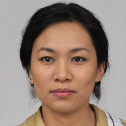 Neutral asian young-adult female with medium  black hair and brown eyes