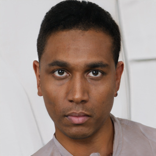 Neutral black young-adult male with short  black hair and brown eyes