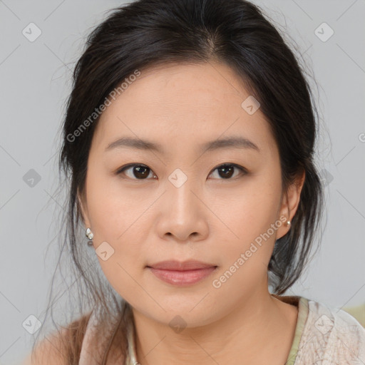 Joyful asian young-adult female with medium  brown hair and brown eyes