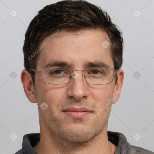 Joyful white adult male with short  brown hair and brown eyes