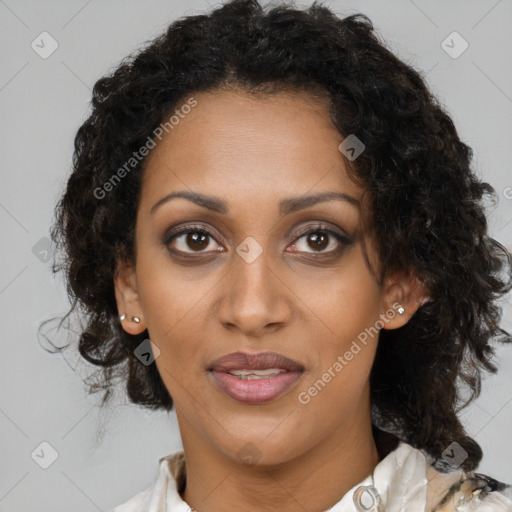 Joyful black young-adult female with medium  brown hair and brown eyes