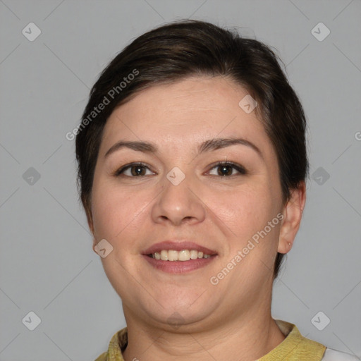 Joyful white adult female with short  brown hair and brown eyes