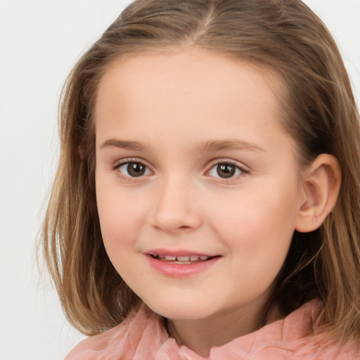 Joyful white child female with medium  brown hair and brown eyes