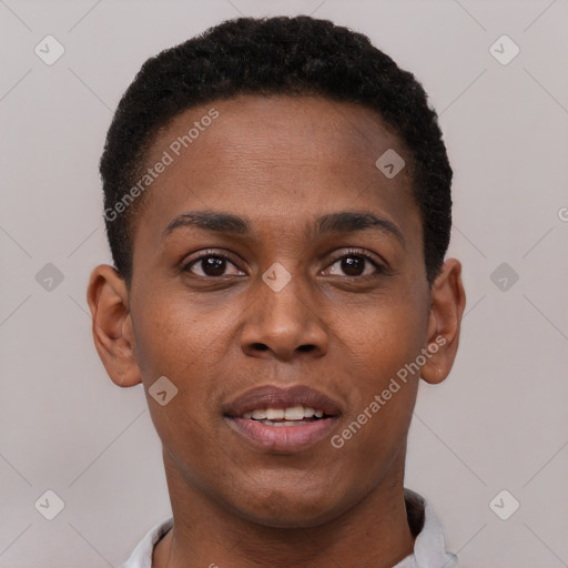 Joyful black young-adult male with short  brown hair and brown eyes