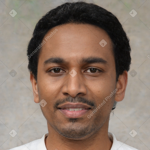 Joyful latino young-adult male with short  black hair and brown eyes