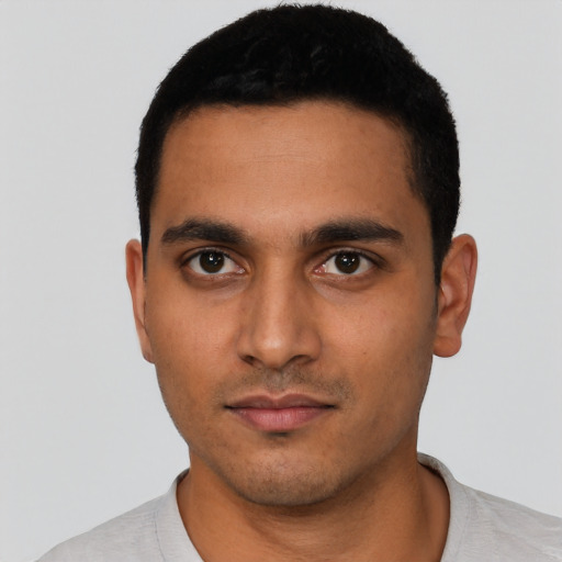 Neutral latino young-adult male with short  black hair and brown eyes