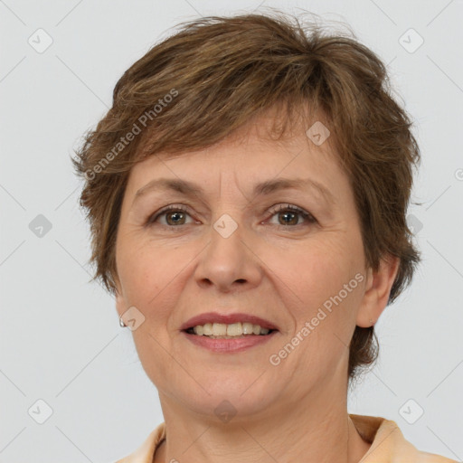 Joyful white adult female with short  brown hair and brown eyes