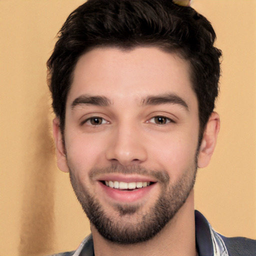 Joyful white young-adult male with short  black hair and brown eyes