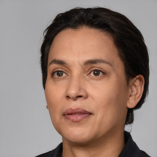 Neutral white adult female with medium  black hair and brown eyes