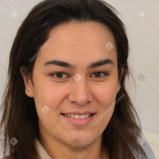 Joyful latino young-adult female with long  brown hair and brown eyes