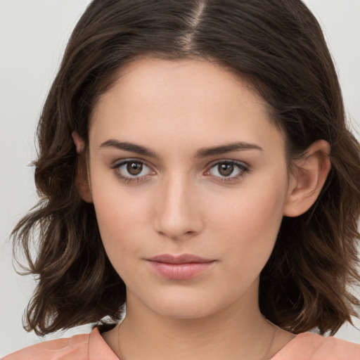 Neutral white young-adult female with medium  brown hair and brown eyes