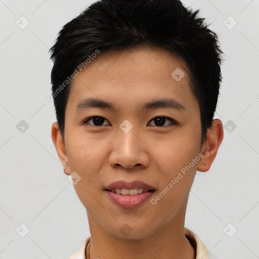 Joyful asian young-adult male with short  black hair and brown eyes