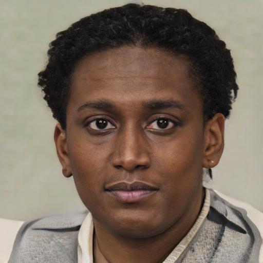 Neutral black young-adult male with short  brown hair and brown eyes