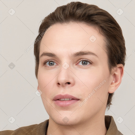 Joyful white young-adult female with short  brown hair and grey eyes