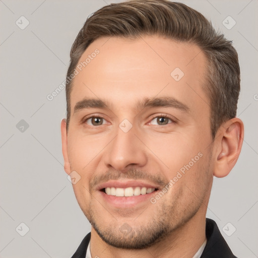 Joyful white young-adult male with short  brown hair and brown eyes