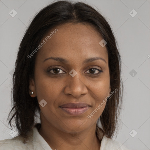 Joyful black young-adult female with medium  brown hair and brown eyes