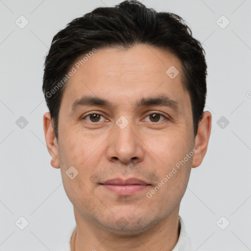 Joyful white adult male with short  brown hair and brown eyes