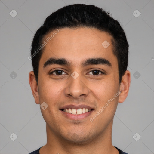 Joyful latino young-adult male with short  black hair and brown eyes