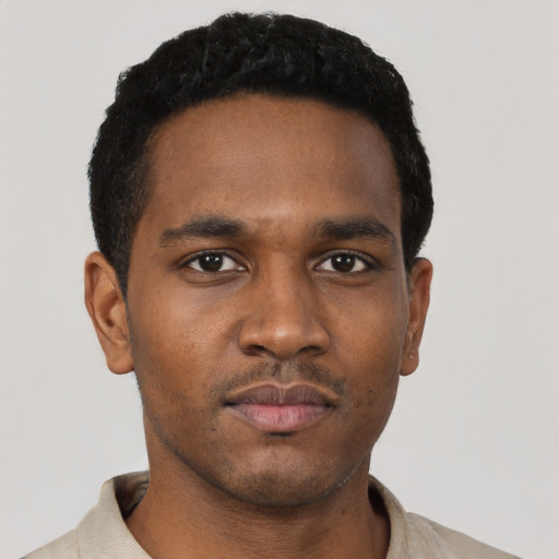 Neutral black young-adult male with short  black hair and brown eyes